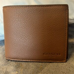 Men’s brown Coach Wallet never used